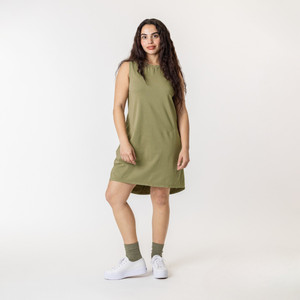 Full body front view of model wearing organic cotton hi low dress in color bay.