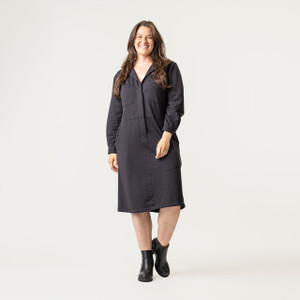Full body front view of model wearing organic cotton workwear dress in color pepper. Full body front view of model wearing organic cotton workwear dress in color pepper.