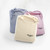 Steel Blue, Wisteria, and Natural solid color organic cotton Sateen Sheet Set in store packaging. Steel Blue, Wisteria, and Natural solid color organic cotton Sateen Sheet Set in store packaging.