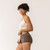 Front close up side view of model wearing organic cotton essentials - women's boyshort 2 pack in color sable. Front close up side view of model wearing organic cotton essentials - women's boyshort 2 pack in color sable.