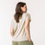Back view of model wearing organic cotton slouch tee in pearl. Back view of model wearing organic cotton slouch tee in pearl.