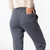 Close up back view with model hand in back pocket in organic cotton classic sweat pant in infinity blue. Close up back view with model hand in back pocket in organic cotton classic sweat pant in infinity blue.