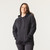 Front view of model wearing 100% Regenerative Organic Certified® Cotton Classic Hoodie in color pepper.