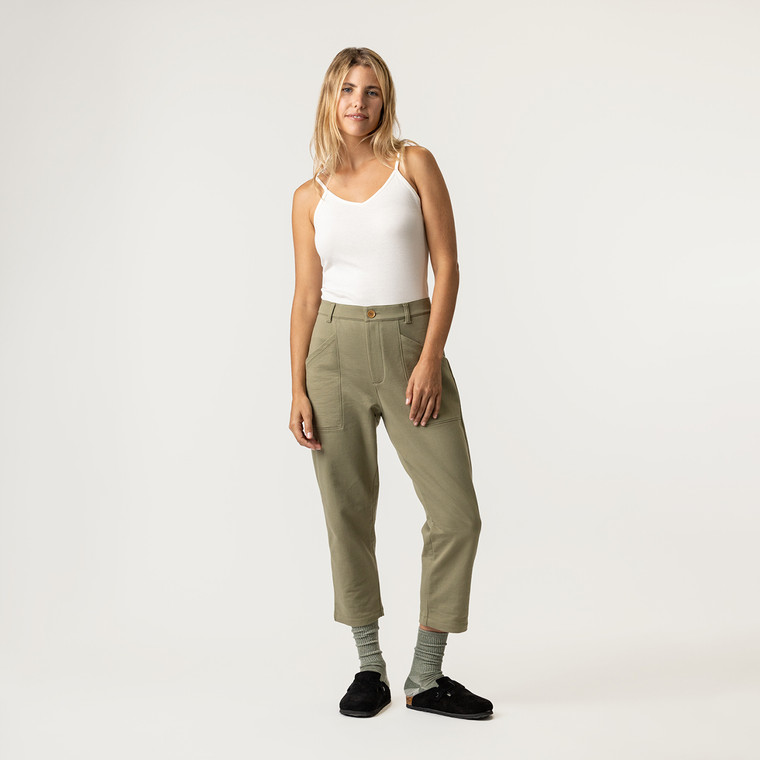 Full body front view of model wearing 100% organic cotton surplus pant in color bay.