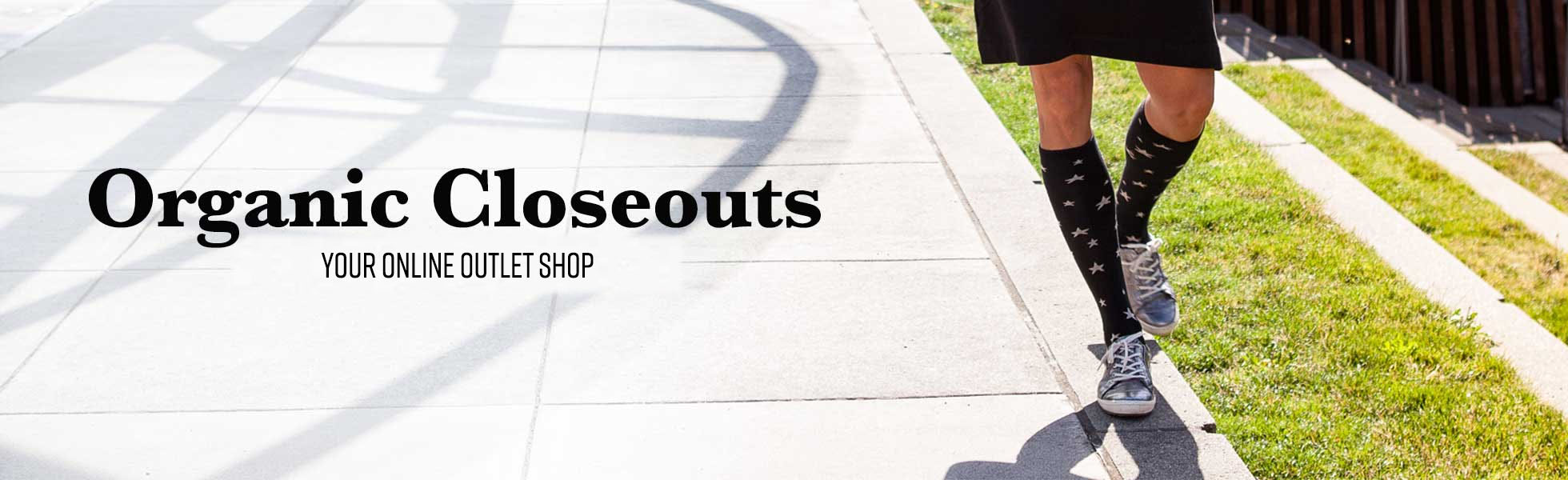 Organic Closeouts Outlet Shop organic closeouts outlet shop, person wearing knee his walking down street