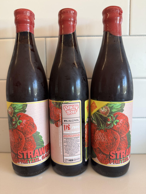 The Dewey Strawberry Pretzel Salad are three of 200 bottles and 8% ALC/VOL.  It's a 2025 Edition and aged for 13 months in Rum Barrels with freshly picked Strawberries & a dash of Pretzels.
One of our most iconic flavor drops is dedicated to that perfect sweet-meets-salty combo.  Expect bright strawberry, a touch of creamy nostalgia, and just the right pretzel bite.  All poured up in a way only Dewey can do.