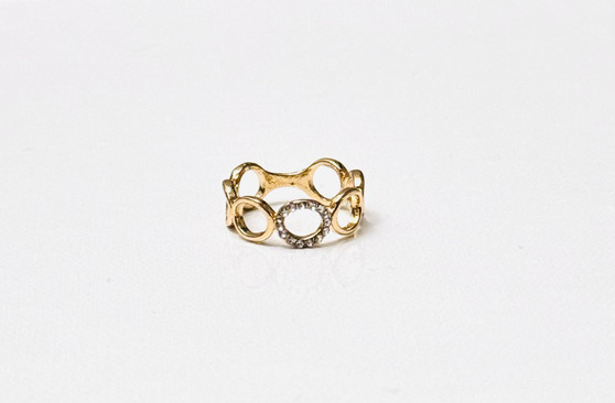 gold ring with circular design