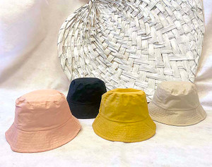 Ladies Wholesale Reversible Bucket Hats.  Top off your look with this cotton and polyester blend Reversible Bucket Hat