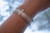 Bracelet-Eden Merry-Magnetic-White Cross by Eden Merry