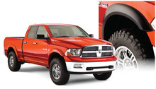 Bushwacker 10-18 Ram 1500 Fleetside Extend-A-Fender Style Flares 4pc 67.4/76.3/96.3in Bed - Black - 50914-02