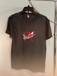Charcoal colored "Peace on Erg," rowing-themed t-shirt depicting Santa relaxing on a rowing machine. Charcoal colored "Peace on Erg," rowing-themed t-shirt depicting Santa relaxing on a rowing machine.