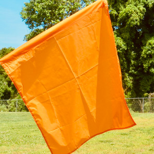 Bright orange regatta finish flag