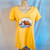 Banana cream yellow version of ladies rowing-themed tee shirt featuring guinea pigs rowing in a coxed pair.