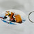 Key chain with rowing guinea pigs in coxed pair boat