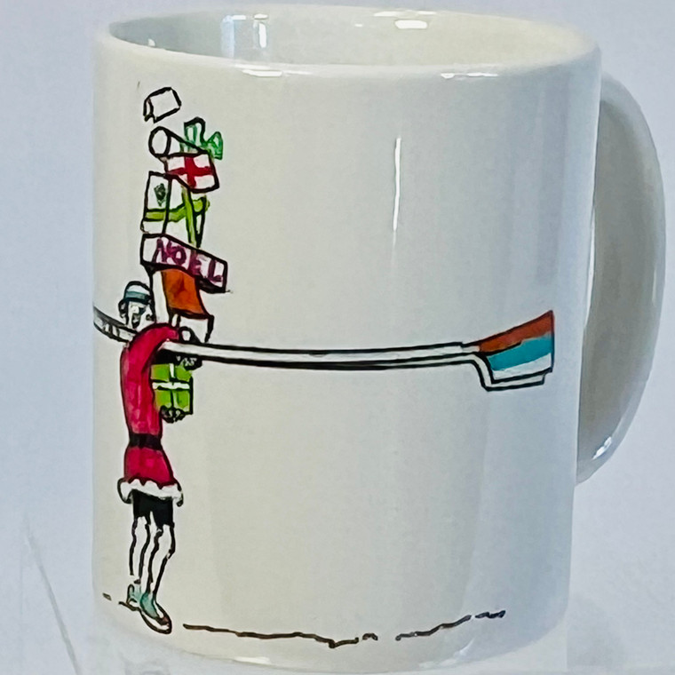 Side one of holiday mug Santa carries presents and oars