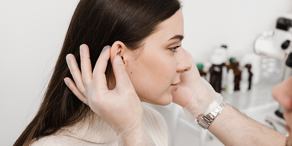 Perforación de lóbulo  1