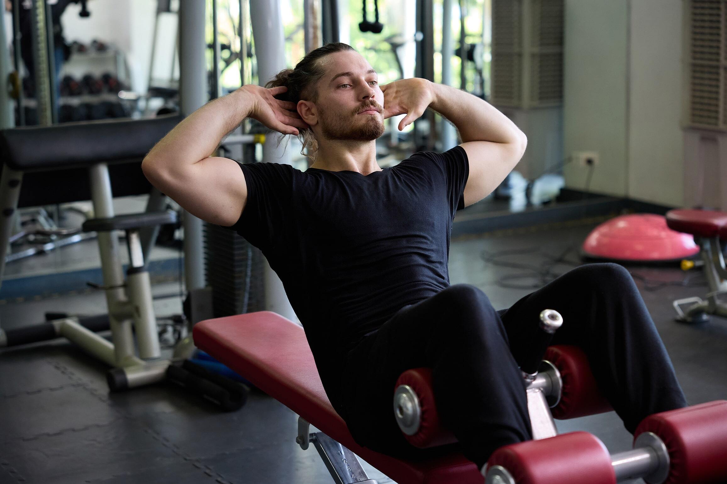 Man working out on his core strength