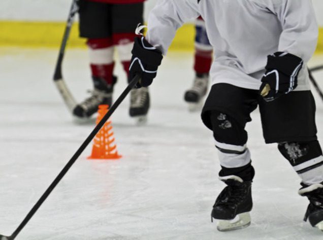 Hockey Player Practicing In Between Tires