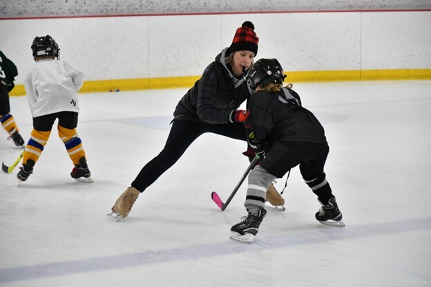 Hockey Player Practicing In Between Tires