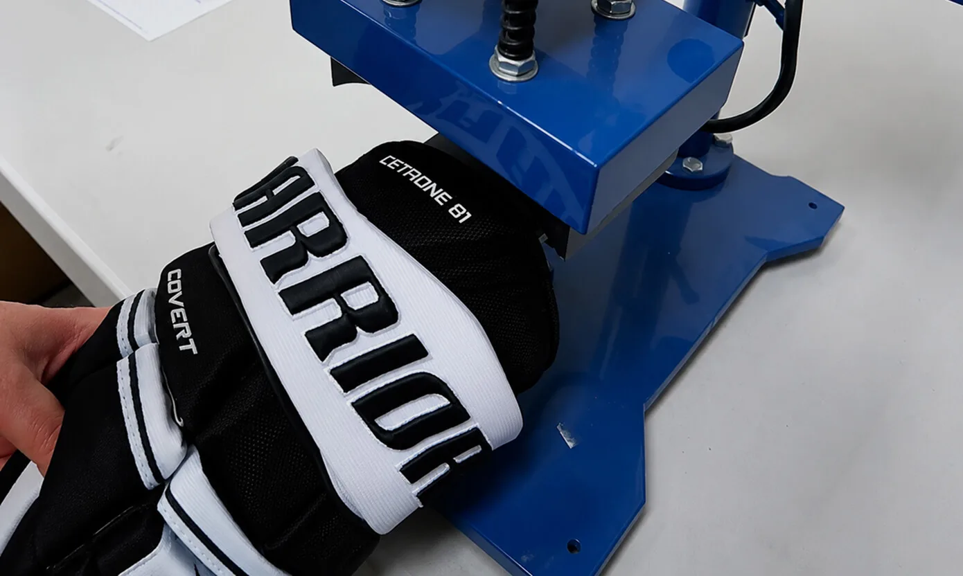 Heat pressing a custom glove