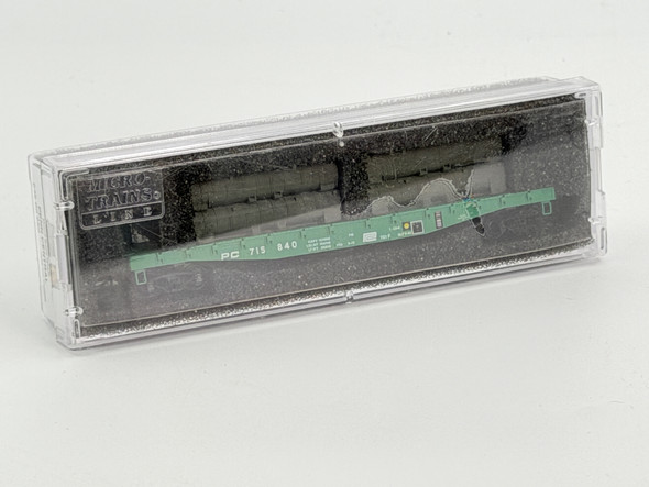 Pre-Owned: Micro-Trains 50’ flat car Fishbelly side w/side mount brakewheel Penn Central 714840 - N Scale
