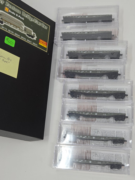 Pre-Owned: Micro-Trains Flat Fish Belly, Side Mounted Brake Wheel 8 car set United States Army USAX 38029 38070 38173 38199 38269 38333 38467 38625 - N Scale