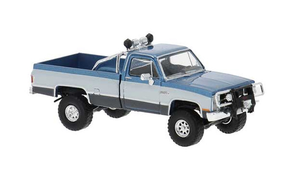 Brekina 19660 - 1981 GMC Sierra Grande Pickup Truck  Metallic Blue, White  - HO Scale