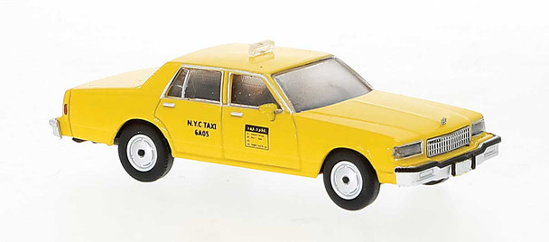 Brekina 19702 - 1987 Chevrolet Caprice Sedan - Taxi (yellow)  - HO Scale
