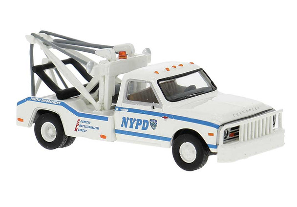 Brekina 19668 - 1981 GMC C30 Tow Truck  New York Police Department (white, blue)  - HO Scale