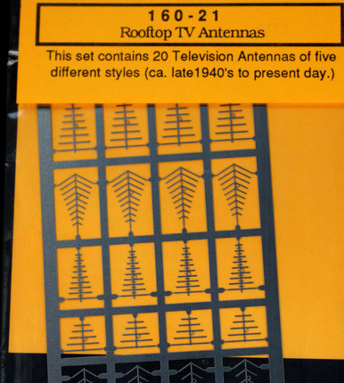A lot of satellite and cable television antennas are located on the rooftop of a