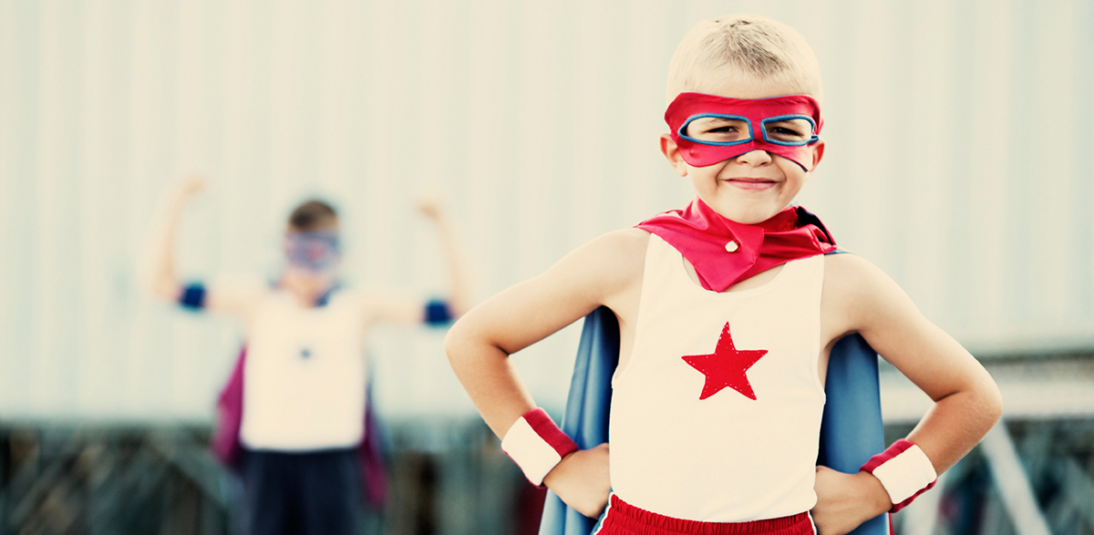 Boy in superhero costume