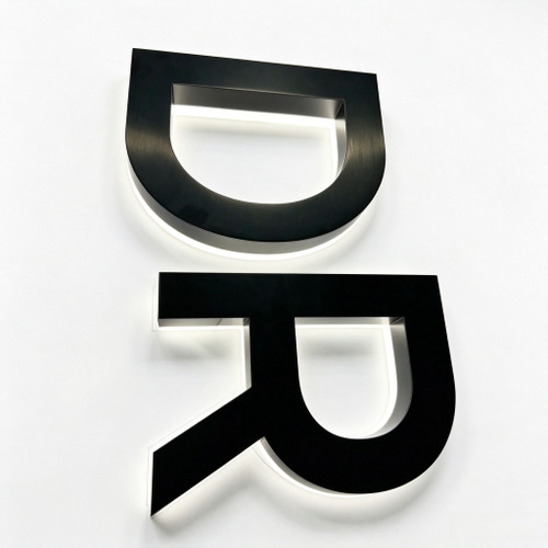 Backlit stainless steel channel letter logo