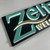 Close-up edge lighting metal sign craftsmanship