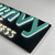 Backlit Stainless Steel Channel Letter Close-up - Illumination Detail