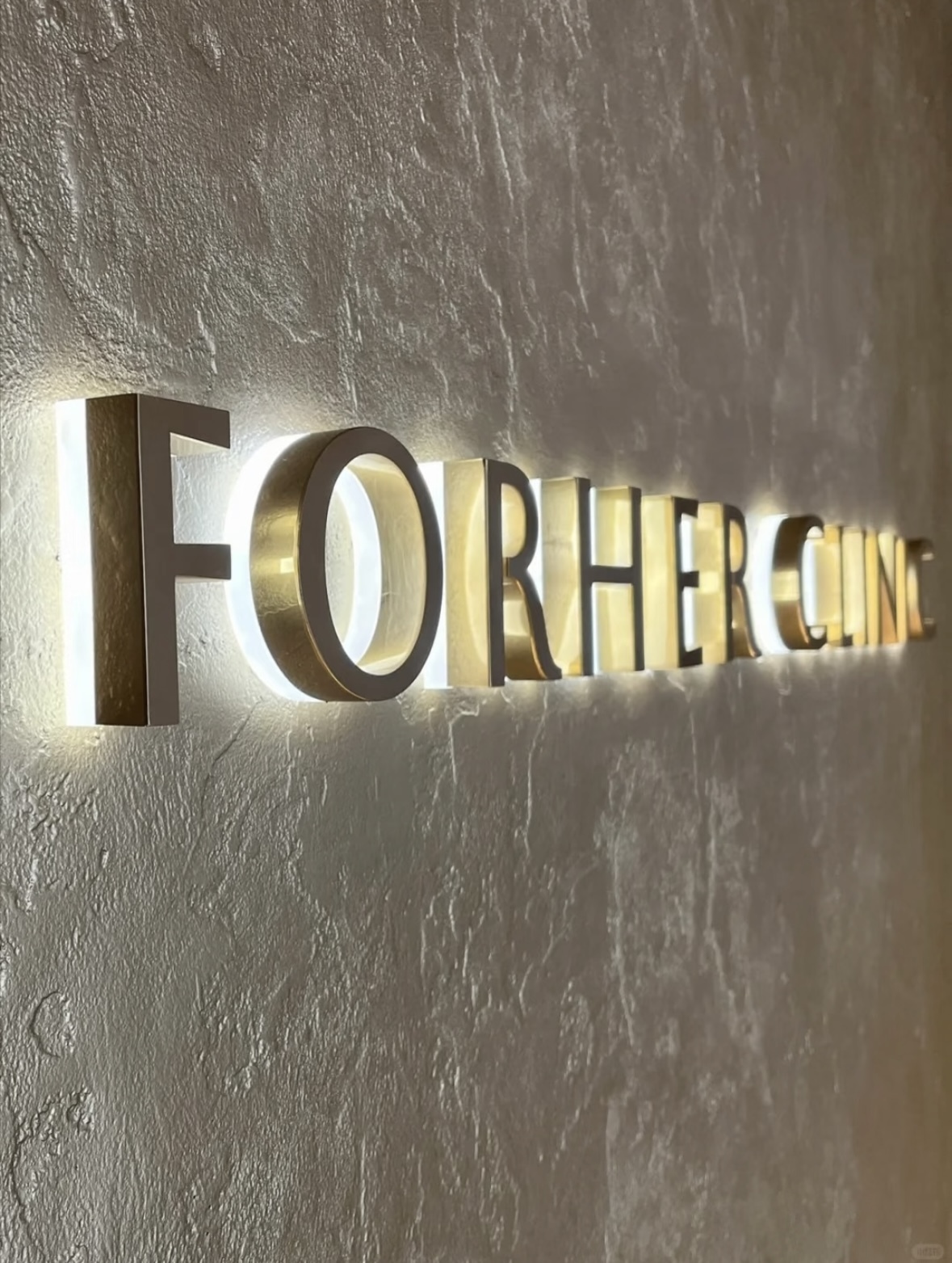 Backlit Stainless Steel Channel Letters - Side View & Illumination Detail