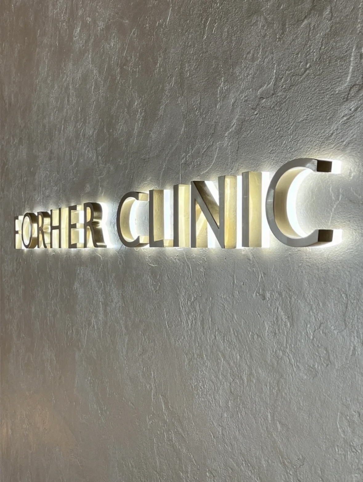 Backlit Stainless Steel Channel Letters - Side View & Illumination Detail