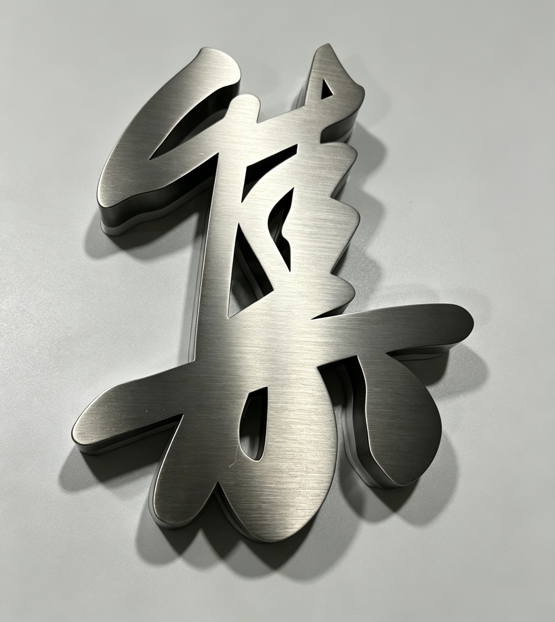 Premium brushed metal 3D lettering for corporate branding