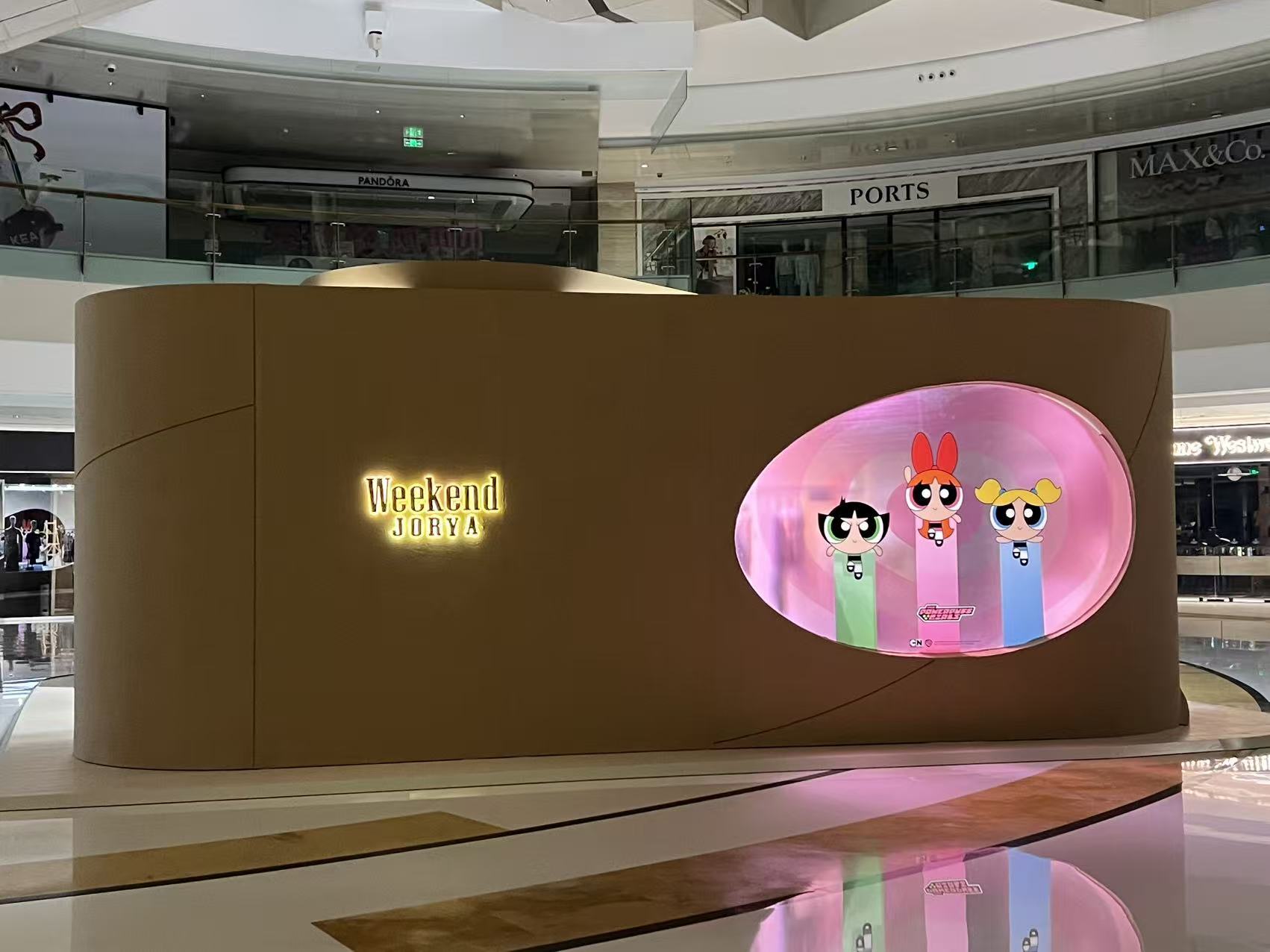 Backlit stainless steel mall shop wall signage