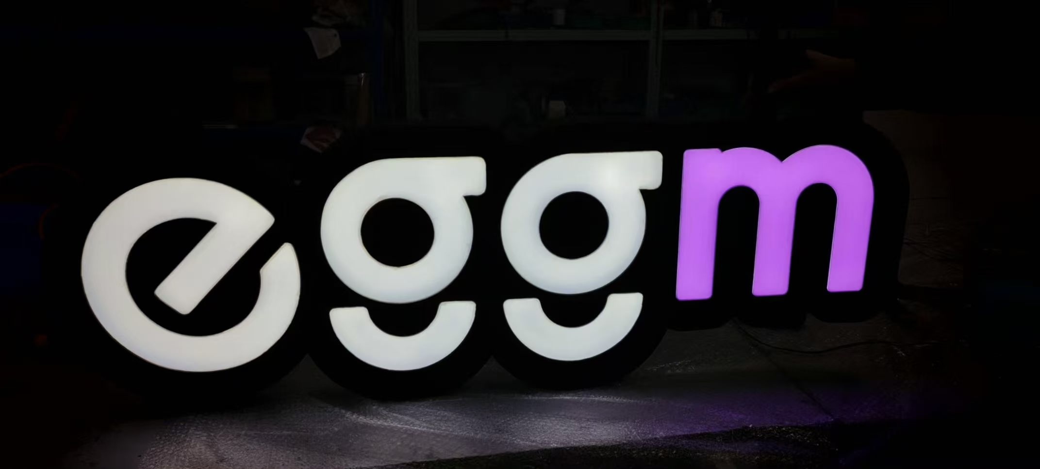 LED halo lit stainless steel sign, illuminated channel letter