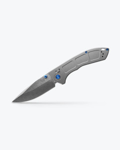Folding knife shown deployed, slim and light titanium handle with sharp drop point blade. Folding knife shown deployed, slim and light titanium handle with sharp drop point blade.