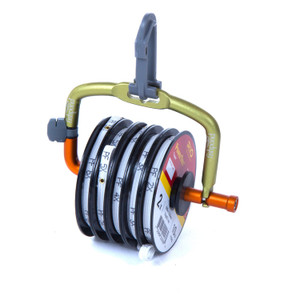 Shows the tippet holder with a clip on top to attach to a bag connected to a greenish yellow rod that is connected to the orange bottom rod that can hold the tippets