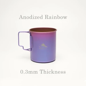 shows small titanium cup with fold-away handle and gradient blue, purple, and pink color