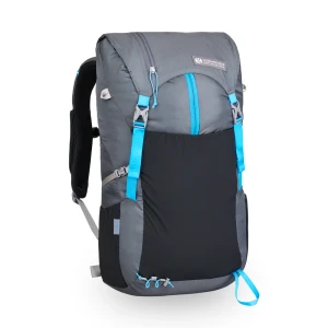 The Loris Pack with stretch mesh on the back of the pack and a center zip from the mesh up. The pack shows a top organizing zip on the hood of the pack and a wide padded harness.