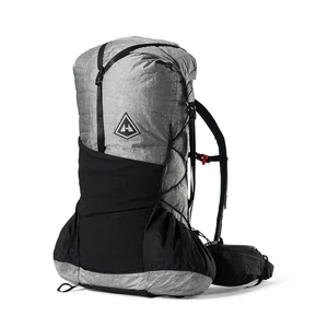 Grey Dyneema model of the Unbound. Shows off the large stretchy pockets on the front and sides of the pack.