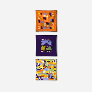 3 towels with different designs showing off landscapes and flora.