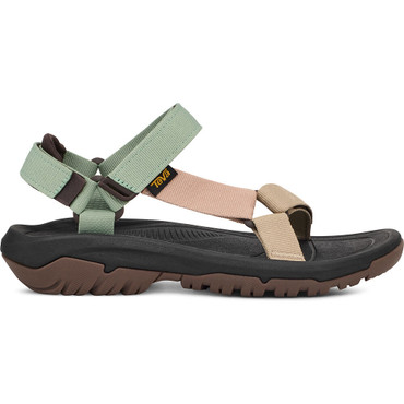 Profile view of adjustable closed heel sandal with one adjustable over the foot strap