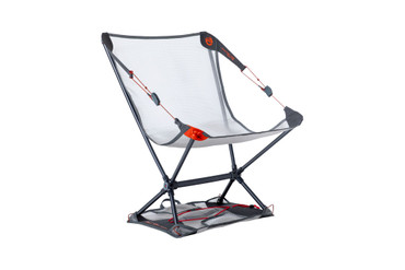 The Moonlite Elite chair in grey, set up with the storage sack as a leg base for loose ground, and showing the webbing with adjusters for reclining.
