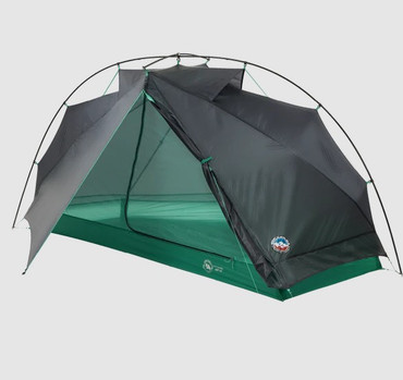 Exterior of the tent with part of the rainfly rolled up. Can slightly see the inter