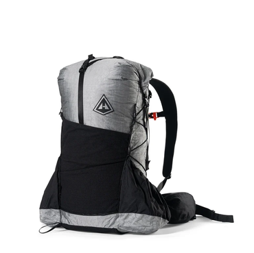 Grey Dyneema model of the Unbound. Shows off the large stretchy pockets on the front and sides of the pack.