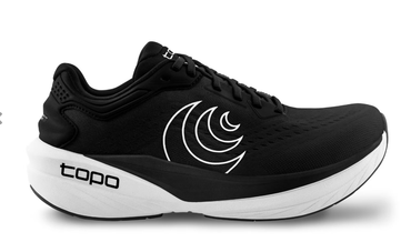 Outside profile of the Phantom shows the robust cushioning of the 35mm stack height. The shoe has a white midsole and black upper with a large Topo logo on the side.